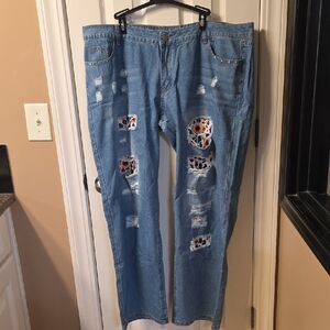 Distressed Blue Jeans with Sunflower Print Accents